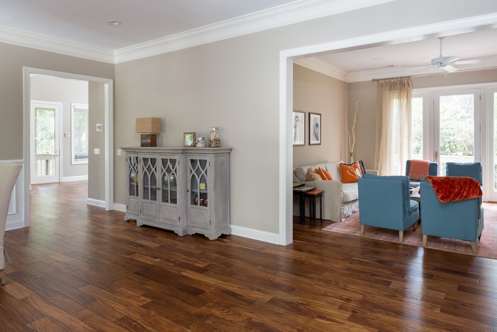 View from foyer into living room and towards the family room