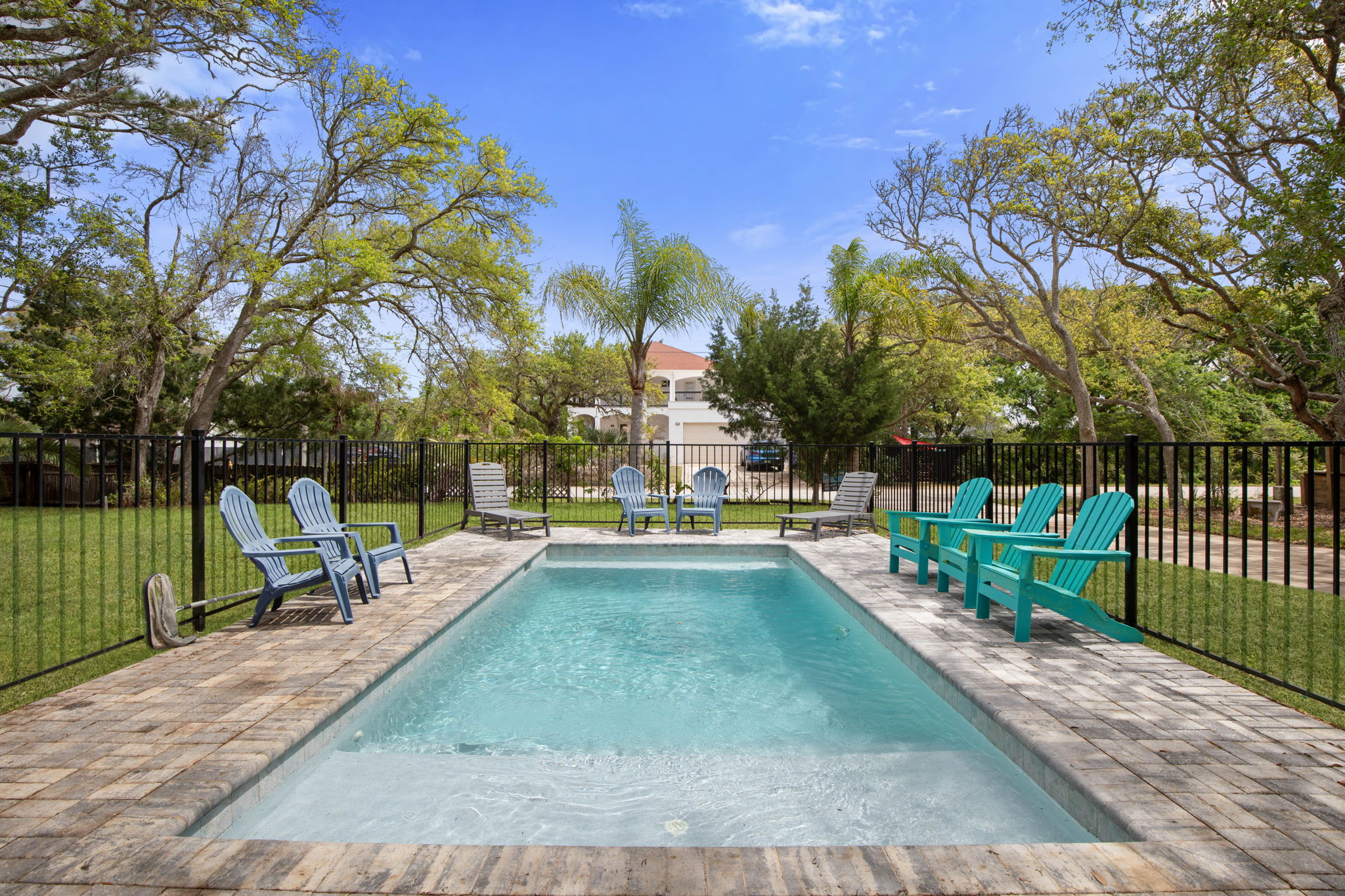 This is where the best vacation days unfold—kids splashing in the pool, grandparents soaking up the sun, and everyone gathering poolside between swims. Under open skies and swaying palms, simple afternoons turn into the family memories you came for.