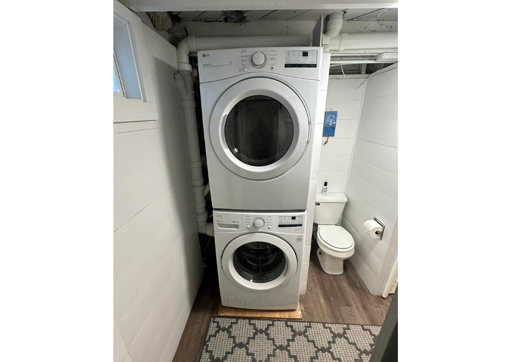 Don't bring your dirty clothes home. We've got you covered with this washer and dryer set in the basement.