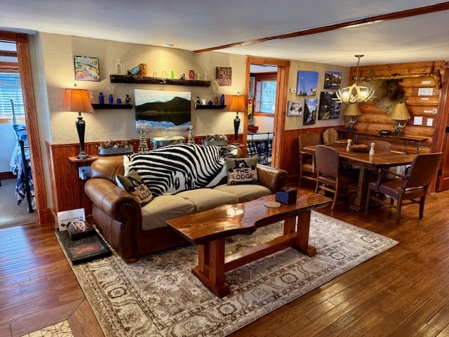 Open‑concept dining and living space designed for relaxing after a day in Rocky Mountain National Park.