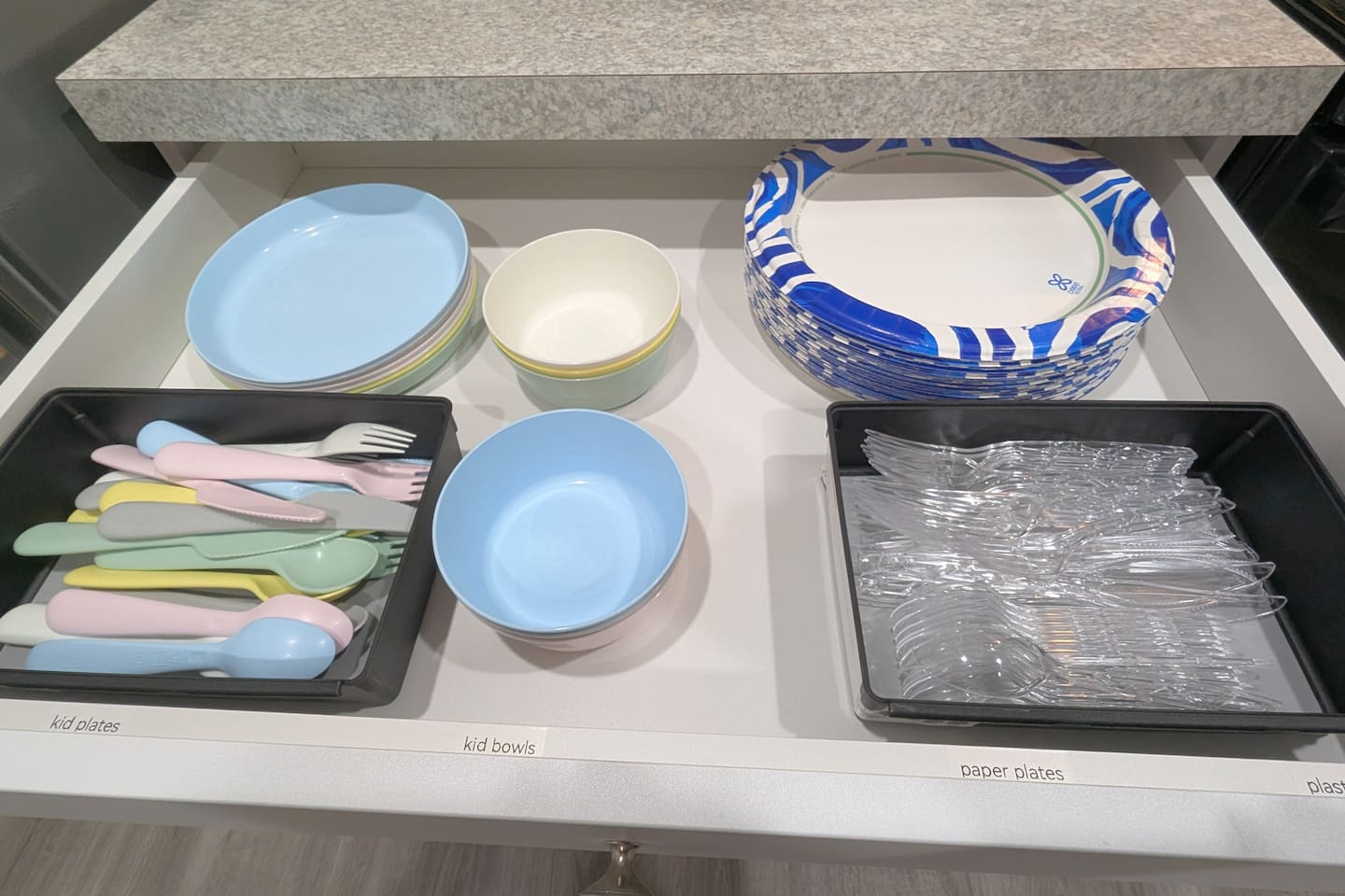 Kid friendly plates & utensils, as well as paper plates and plastic utensils are stocked. 