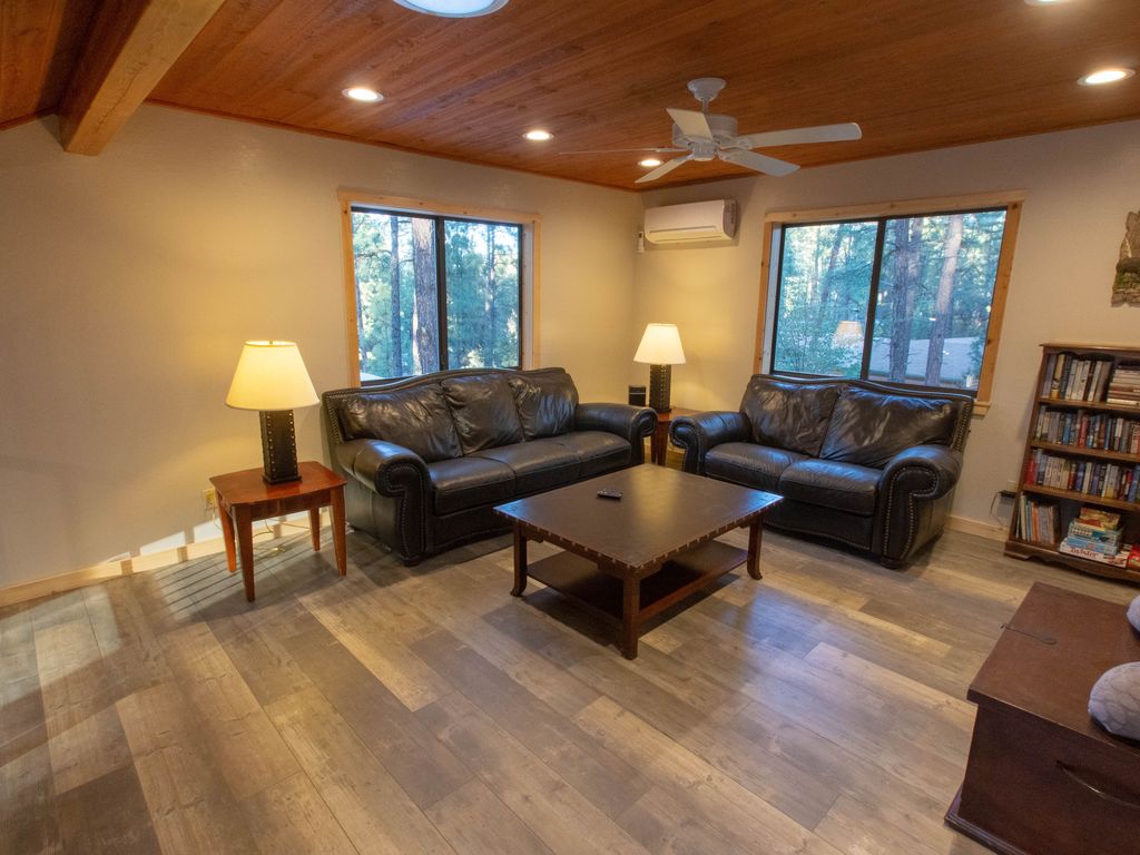 Loft with comfy leather seating,  55 in flat screen TV with Roku programming.