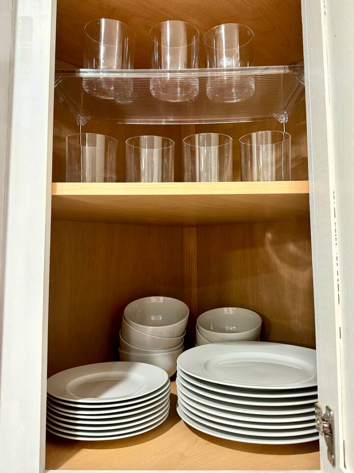Ceramic dishes and plastic glasses for 8