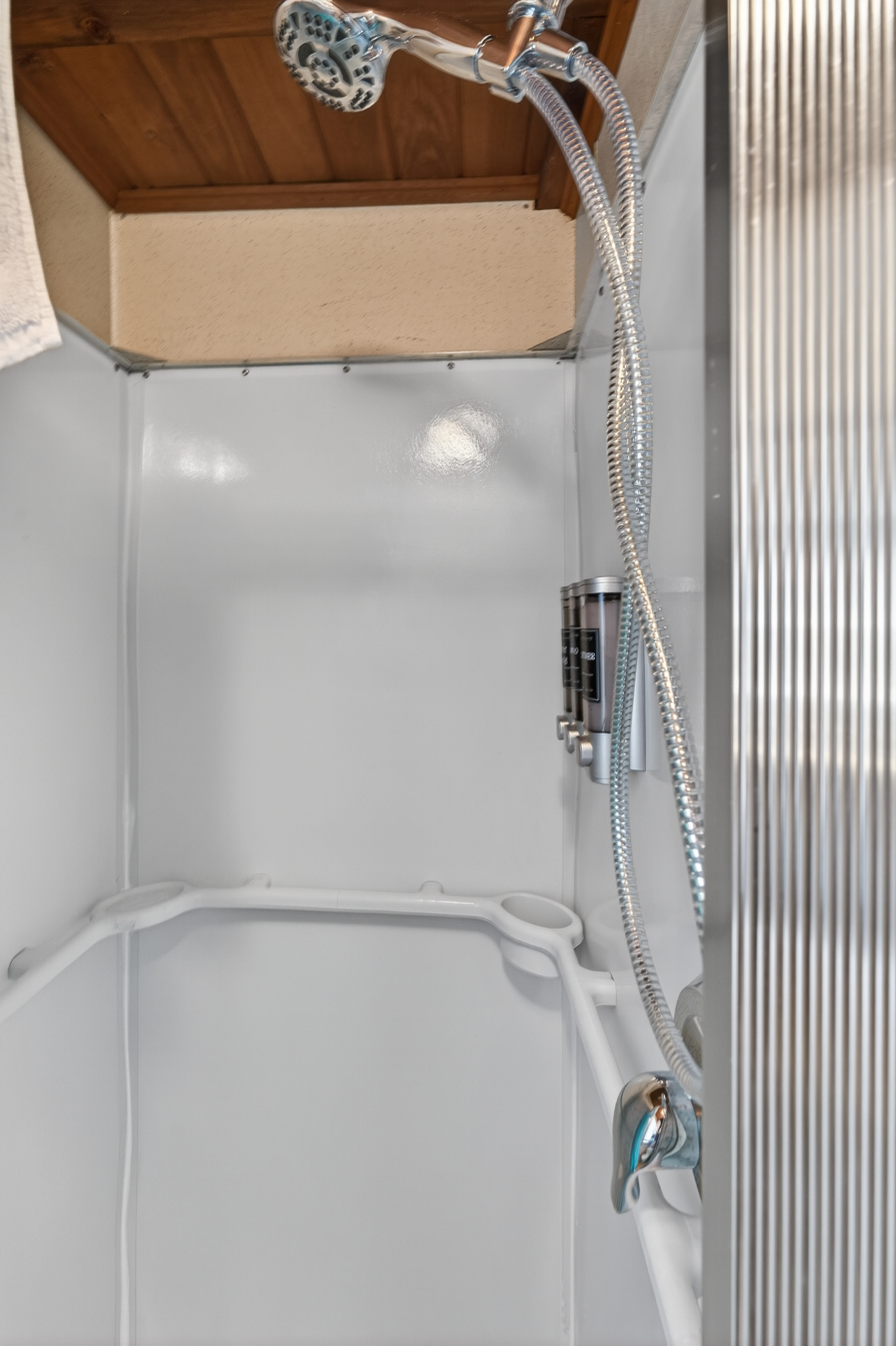 A peaceful full bathroom with a shower that feels fresh and easy!
