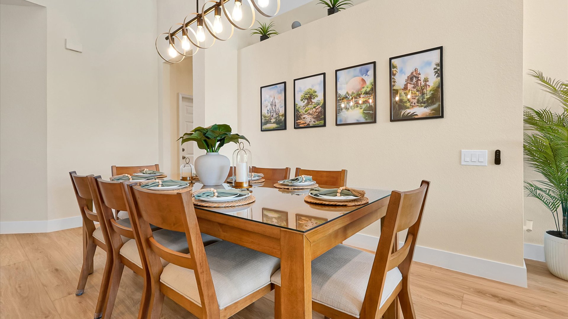 Dining Room: Spacious dining area with seating for 10 and artwork inspired by the four Walt Disney World theme parks.