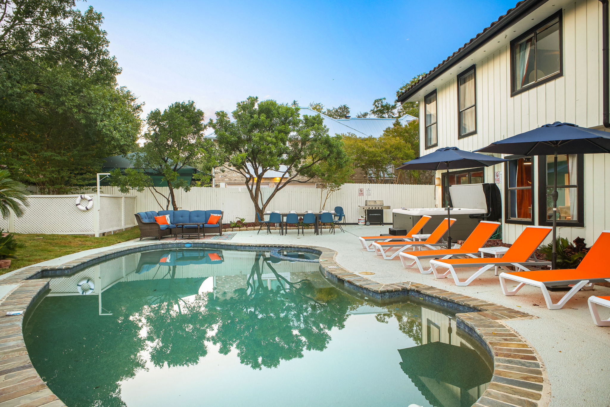 Sunbathe on vibrant orange loungers and soak up the San Antonio sunshine.