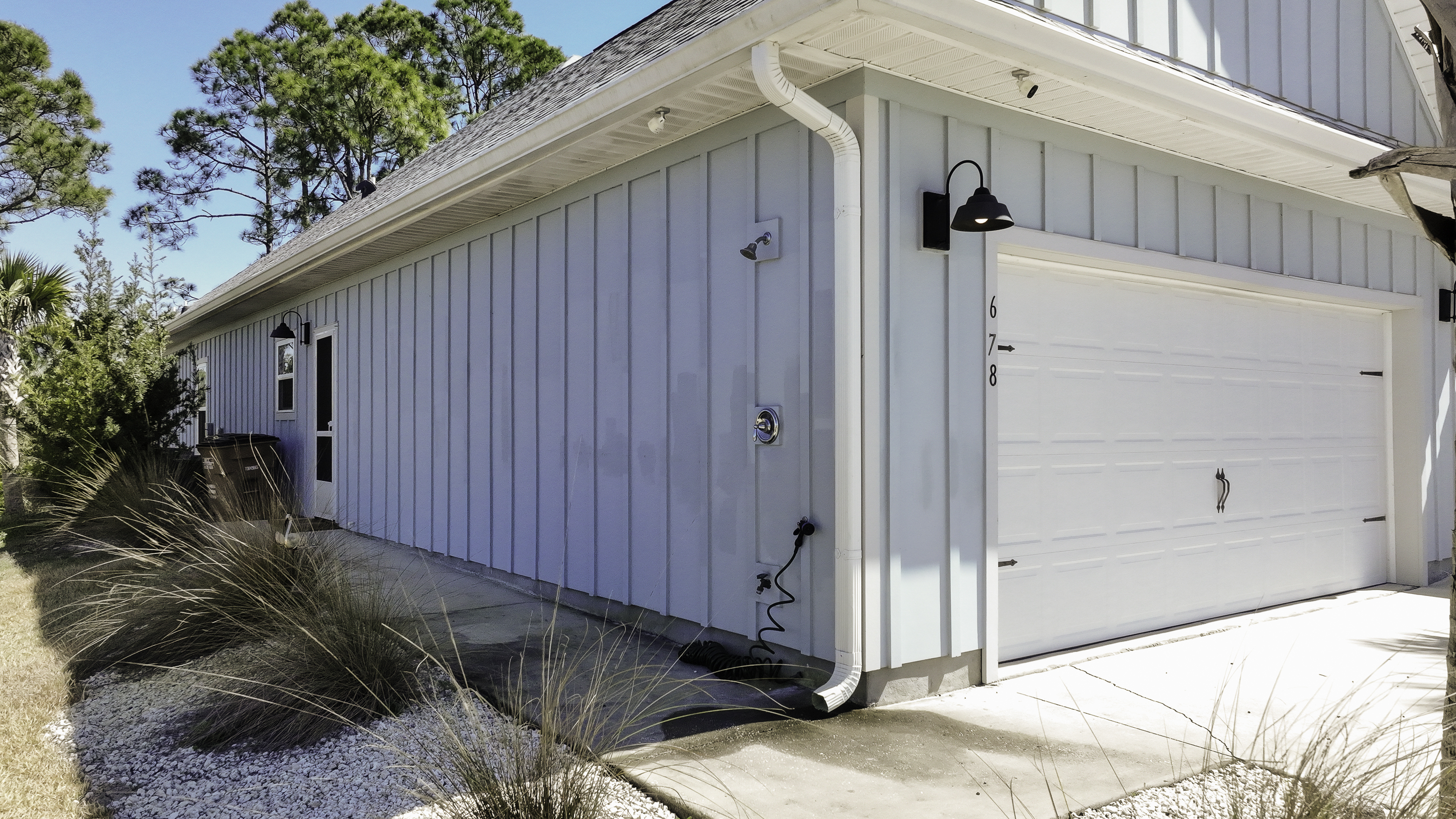 Outdoor shower available to rinse off sand before heading inside.