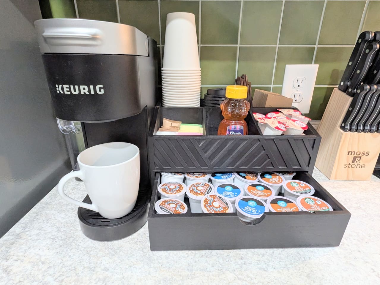 Brew a cup of coffee with all the fixings including to-go cups. 