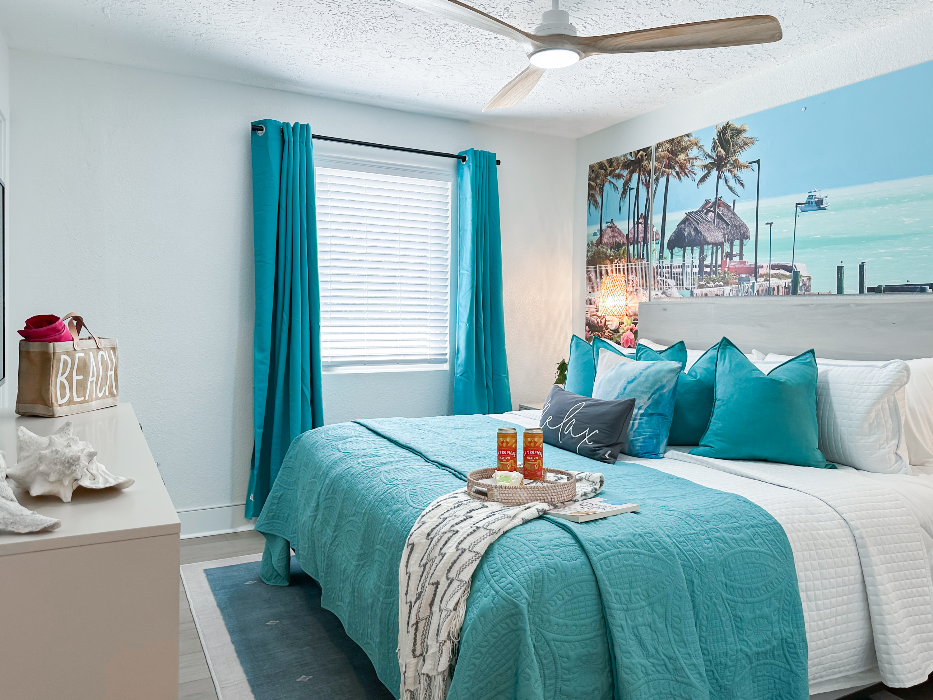 This bedroom has a comfy King bed, a closet, and a dresser.
