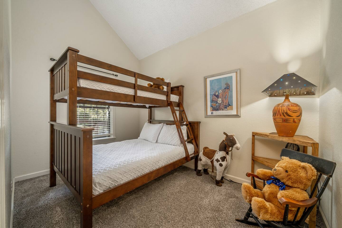 For the youngsters and the young at heart a bunkroom with Full bed (double) and twin sized upper.  -Bunkroom