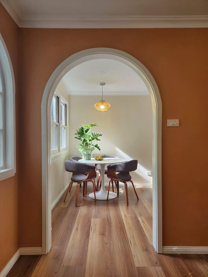 In addition to the large dining table, a 4-seater kitchen eating space is also available. This space doubles as a work area too, with power close by.