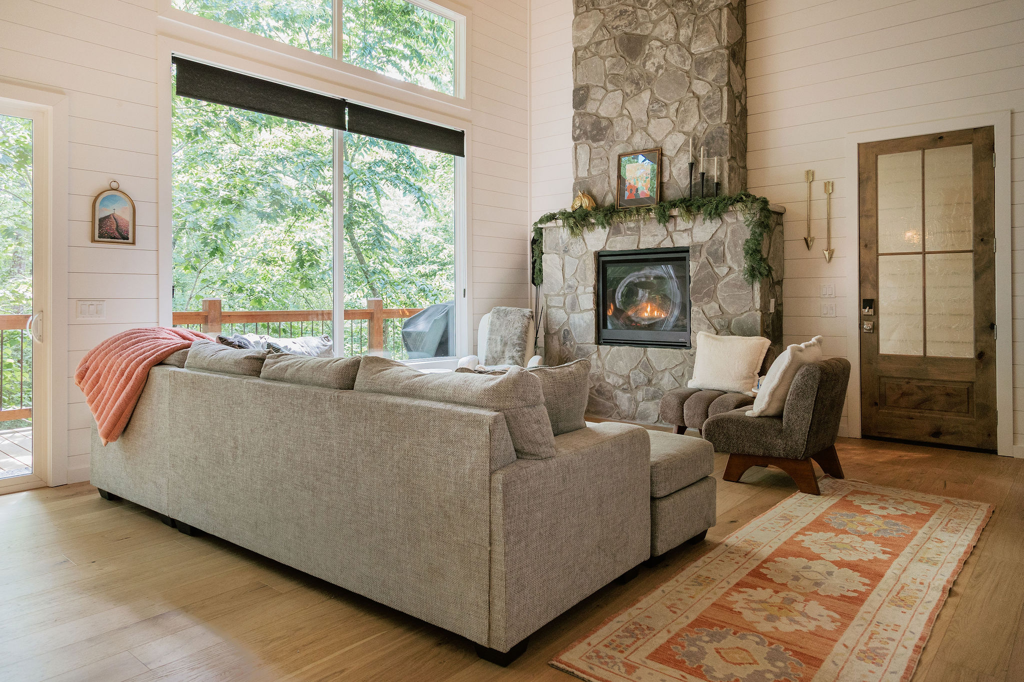 Cozy living space with view of the woods