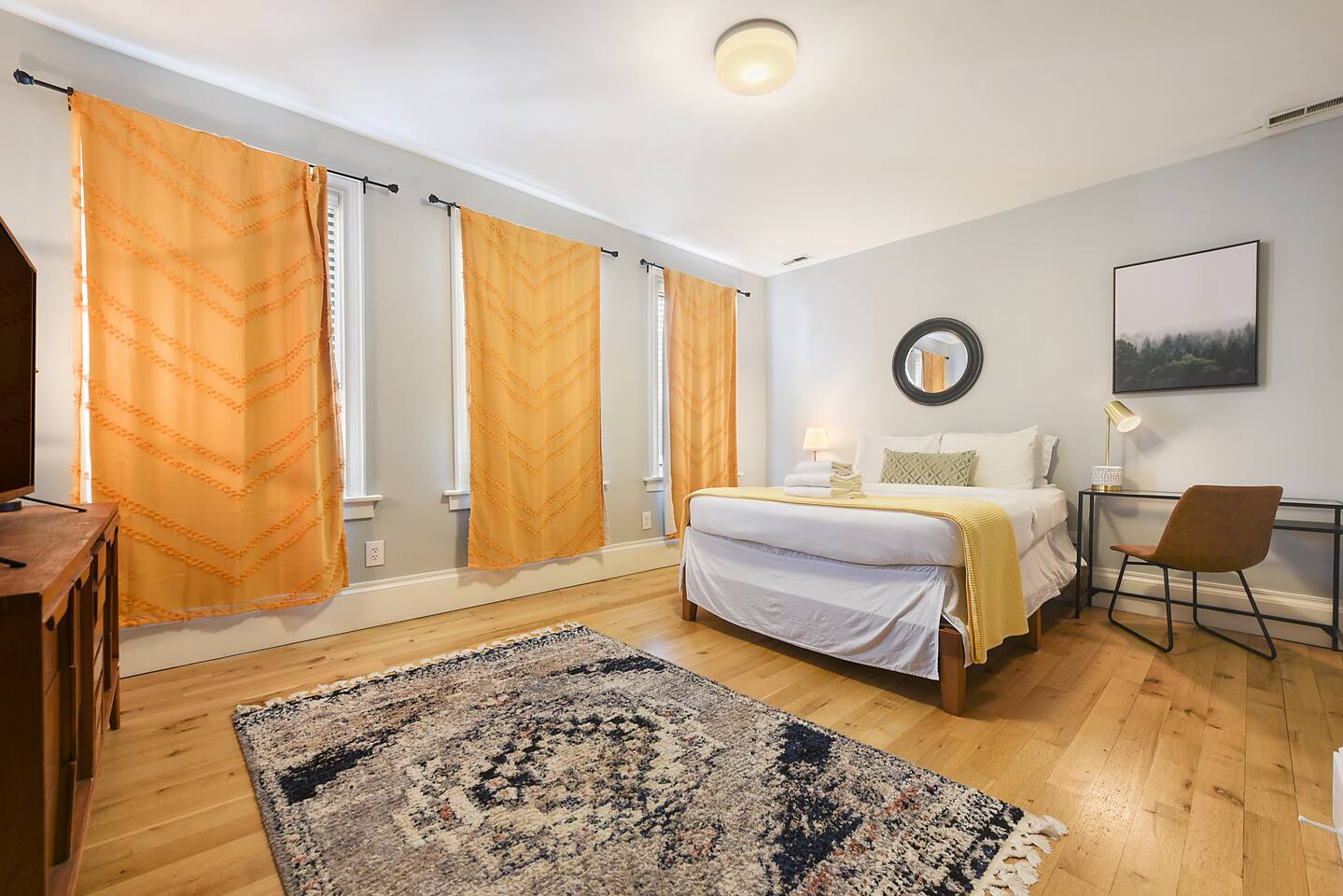 Bedroom with dedicated workspace.