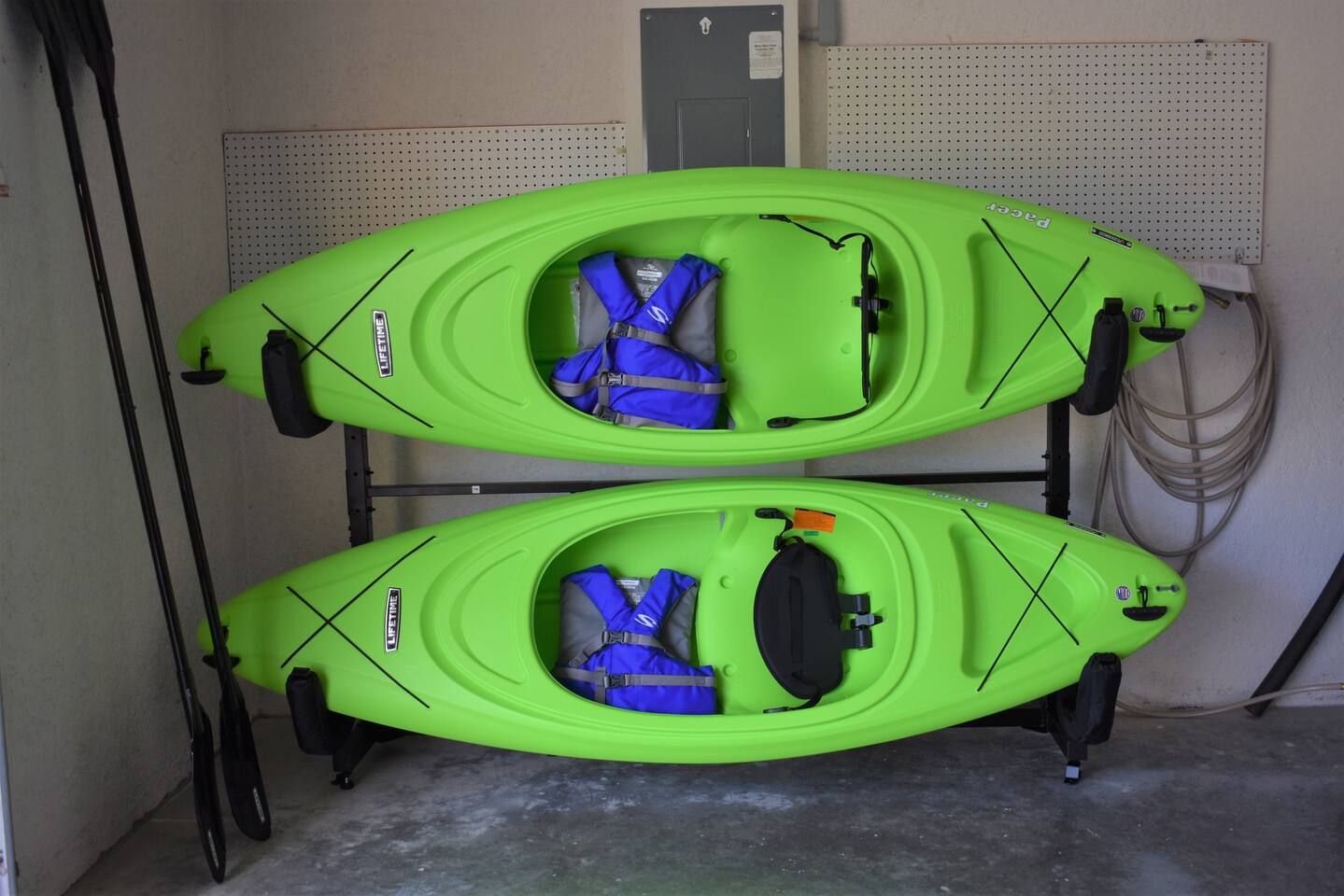 Two kayaks ready for you to explore the canals and nearby lake!