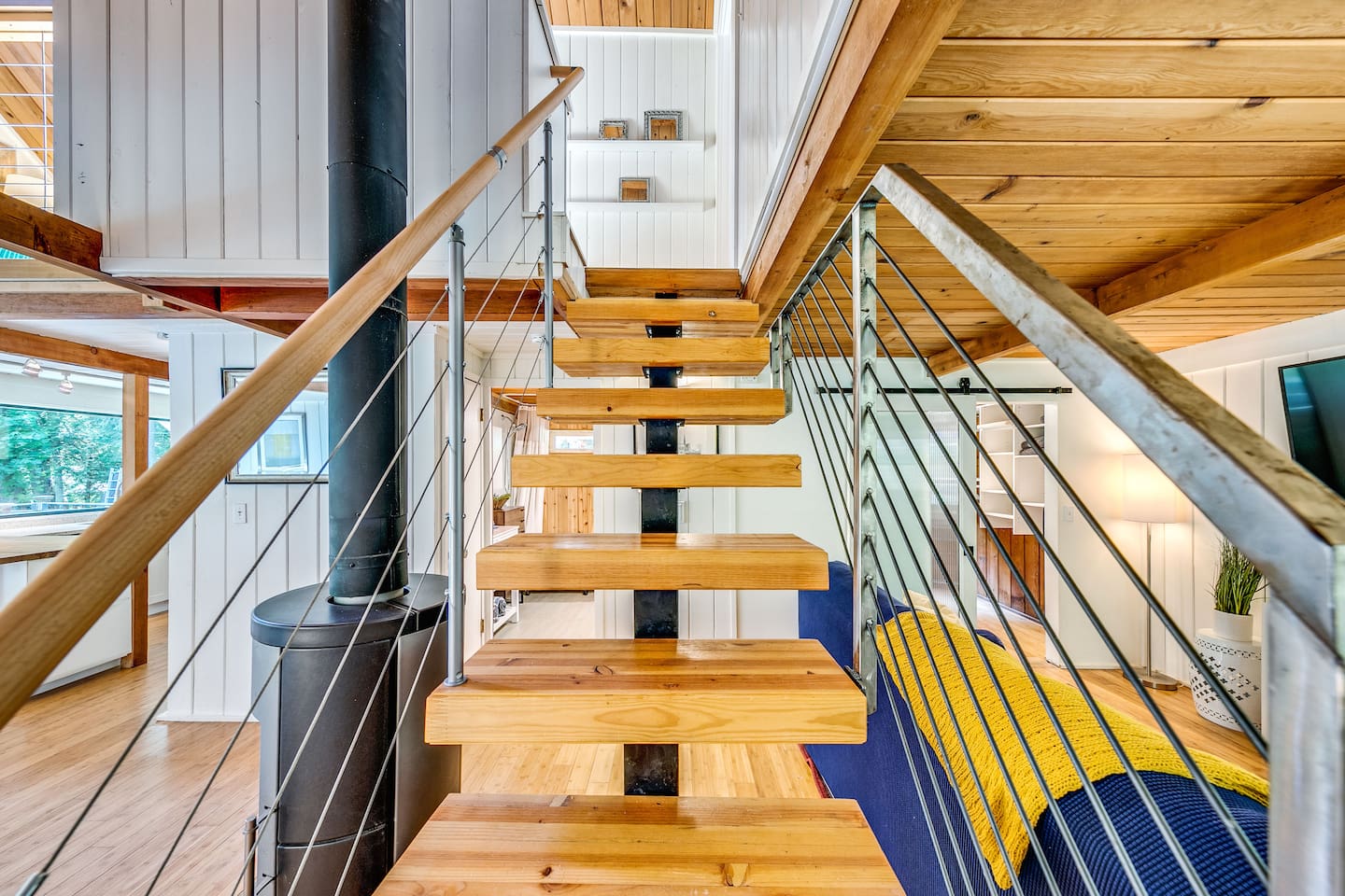 Stairs to the upstairs bedroom and loft