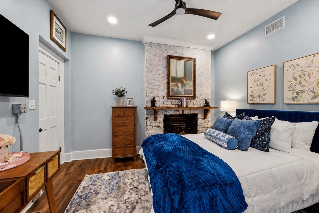The Grace Room. Comfy queen bed. Dresser and vanity. Access to our garden courtyard is through this room.