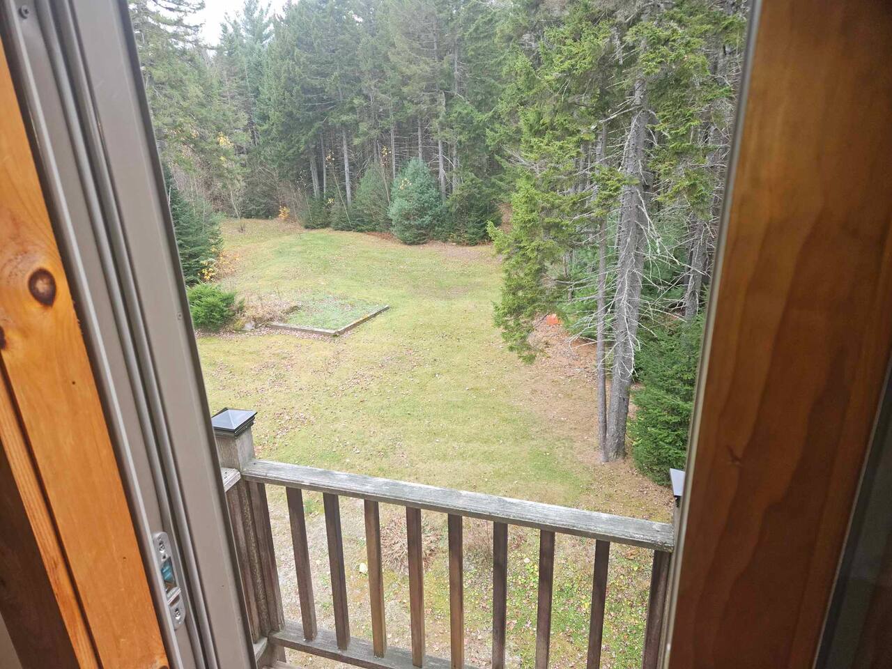 Enjoy the view from the private deck attached to the master bedroom of the second home on the property! 