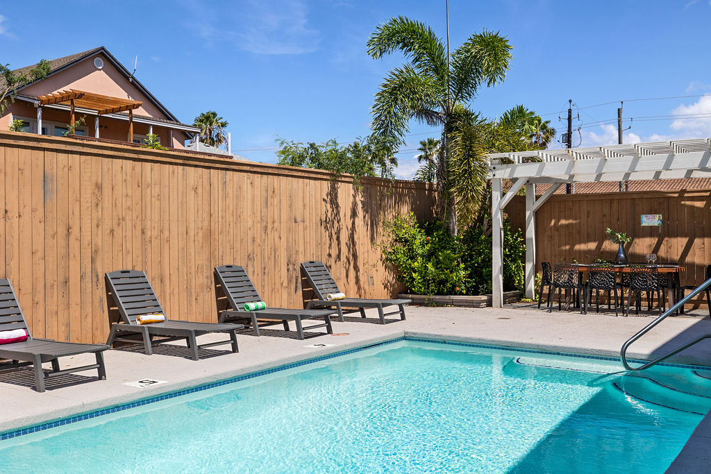 Where Every Hour Feels Like Vacation Time! Sip, swim, and savor — with inviting sun loungers, a crystal-clear pool, and an outdoor dining setup perfect for lazy lunches or romantic dinners.