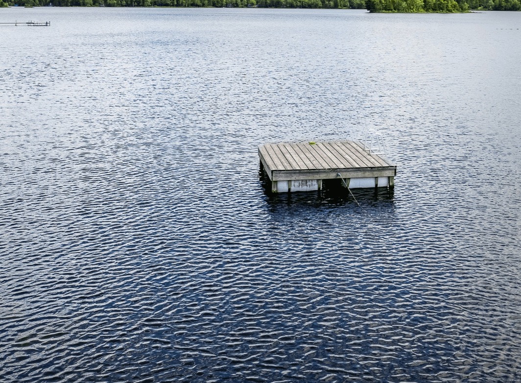 Dock on the water at a Maine lake