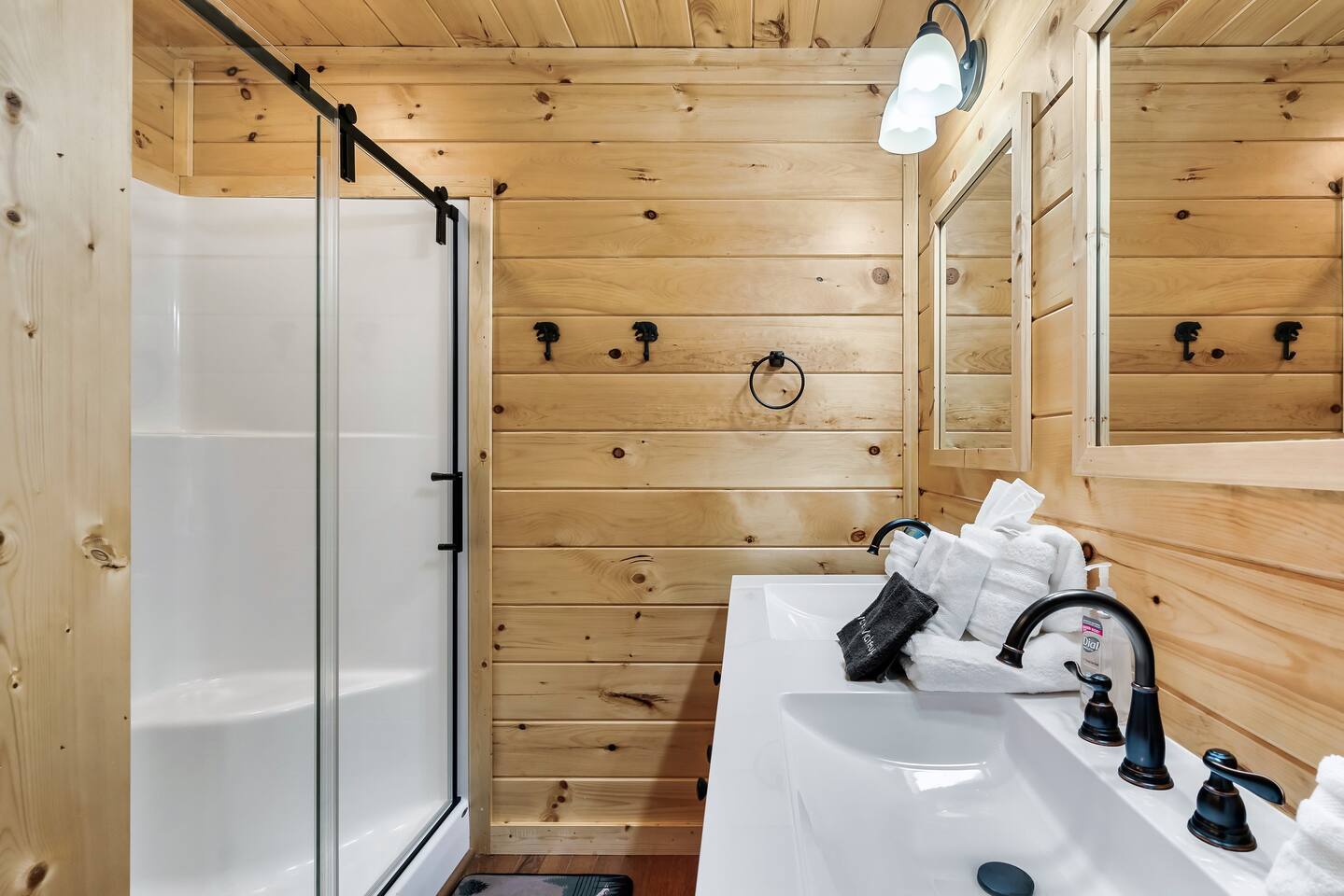 Private upstairs bathroom with soaking tub and shower. Double vanity gives plenty of getting ready space. 