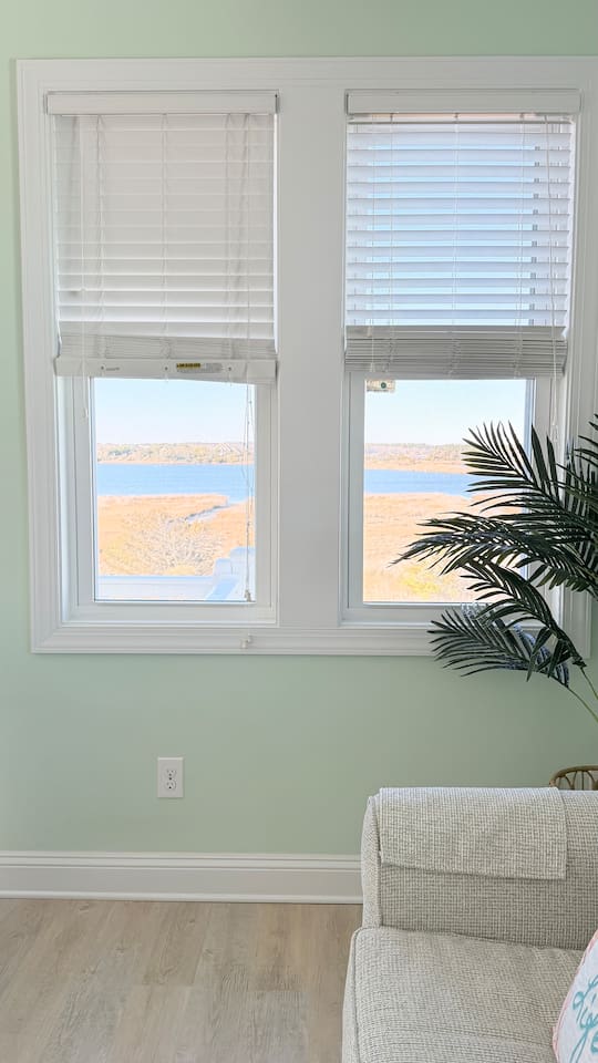 Sitting on the couch enjoying coffee with water views of the sound. Or enjoy the water views from the front back, top and bottom decks!