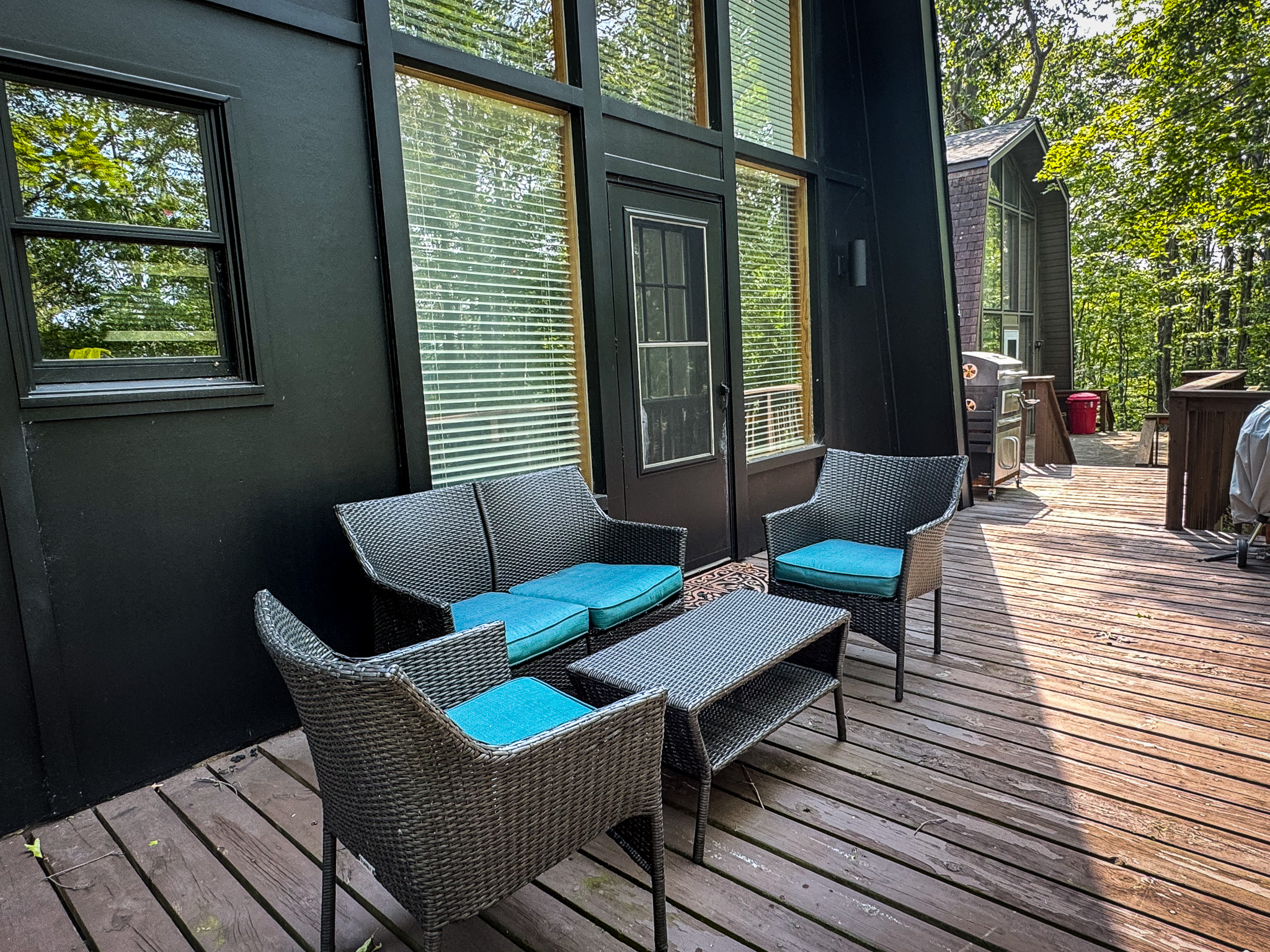 Front deck with seating with charcoal grill