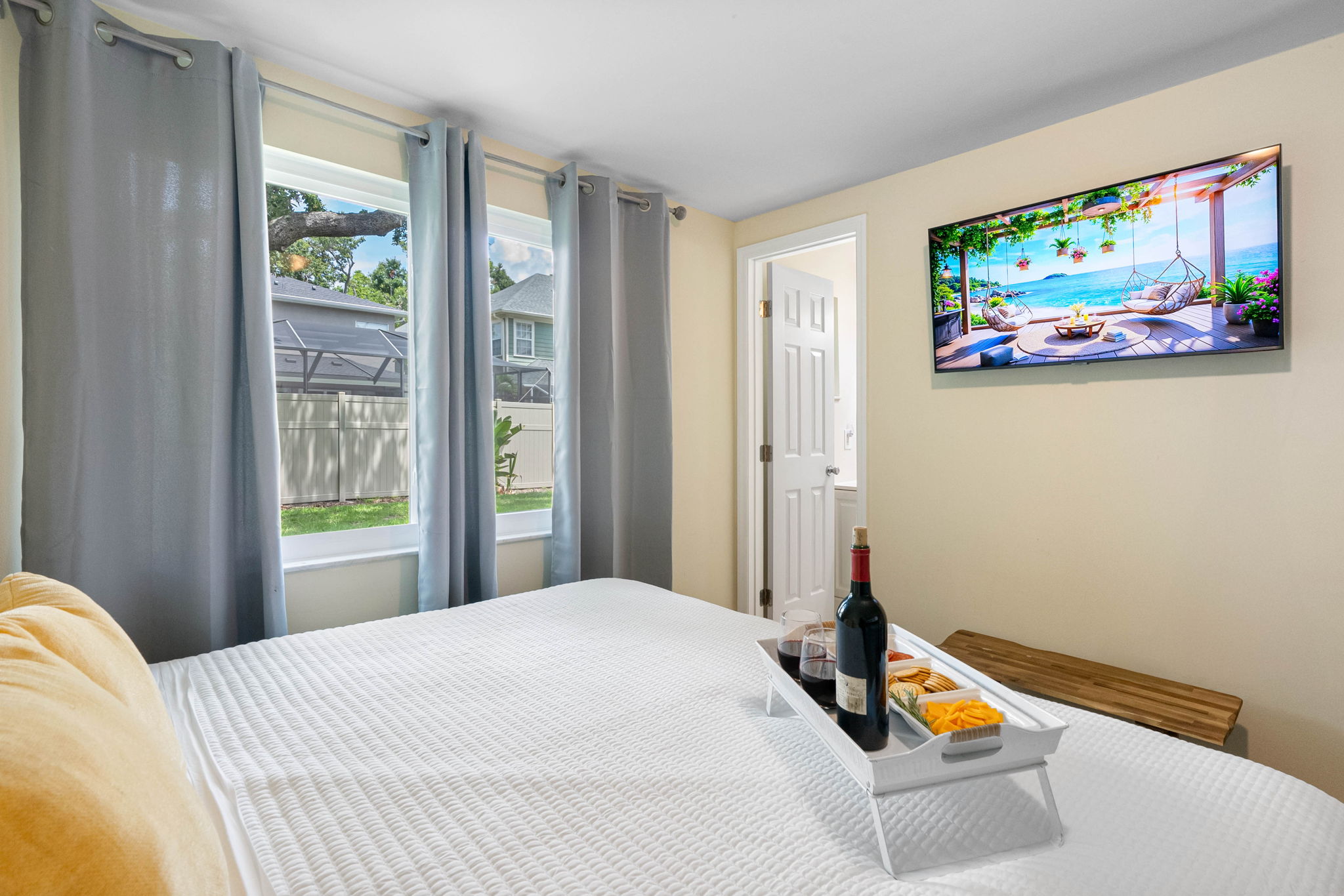 Step into a tranquil, thoughtfully curated bedroom where comfort meets quiet sophistication.