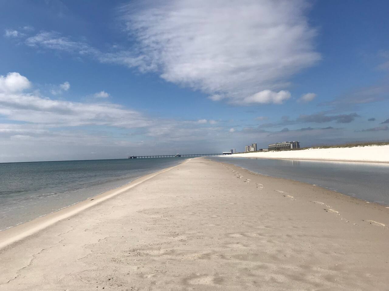 Making footprints in the sand. 
