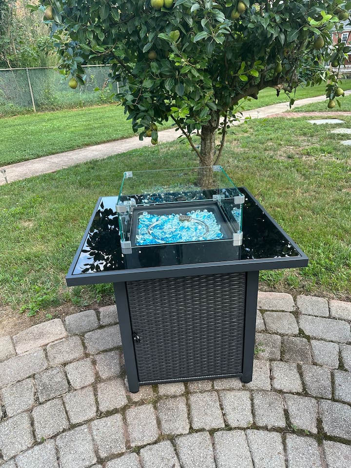 Propane fire pit-  grab the chairs off shed deck or the beach rug from outdoor storage bin and hang by the fire