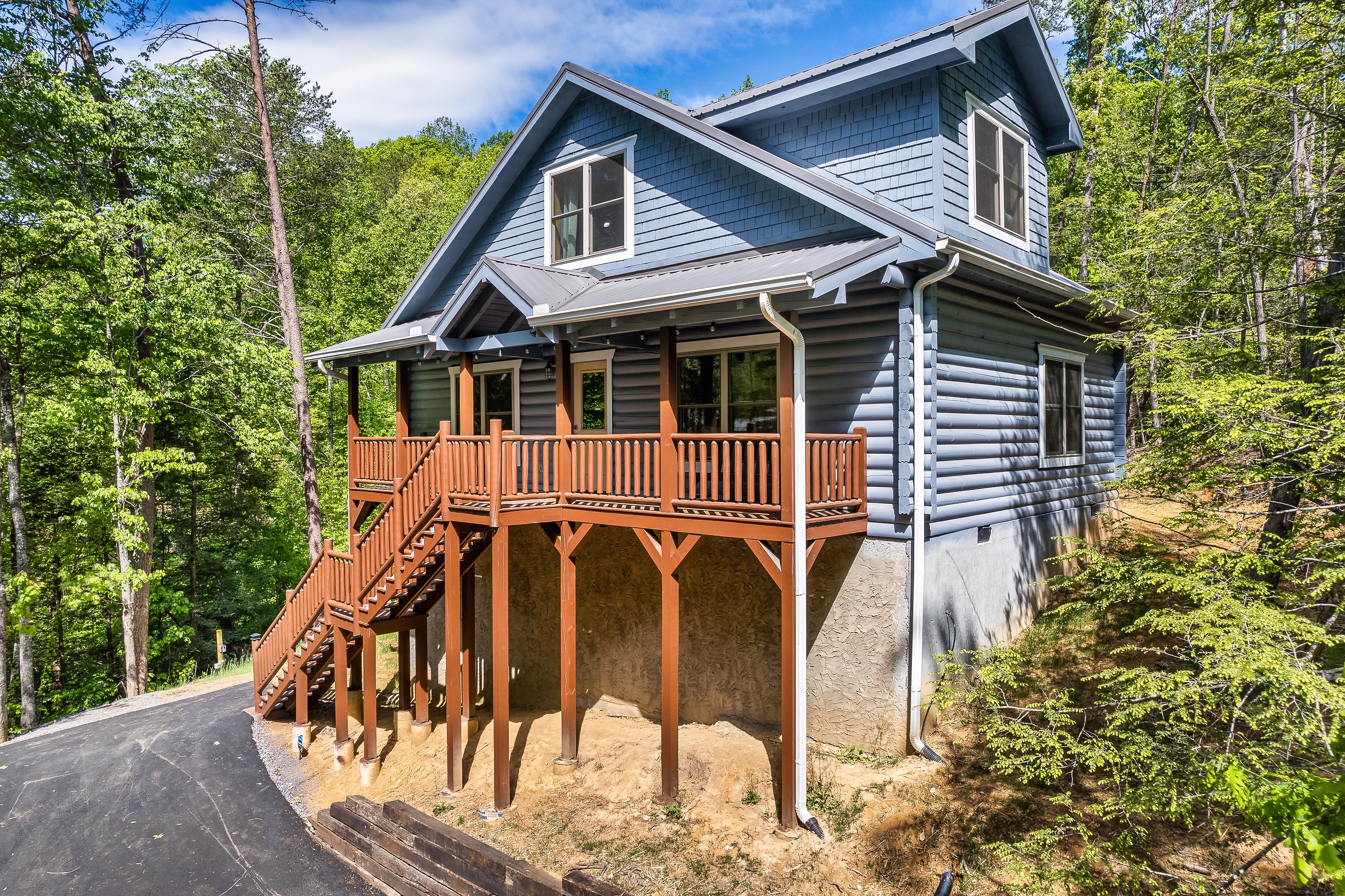 Peaceful, woodsy setting is a welcome sight when first arriving to the cabin.