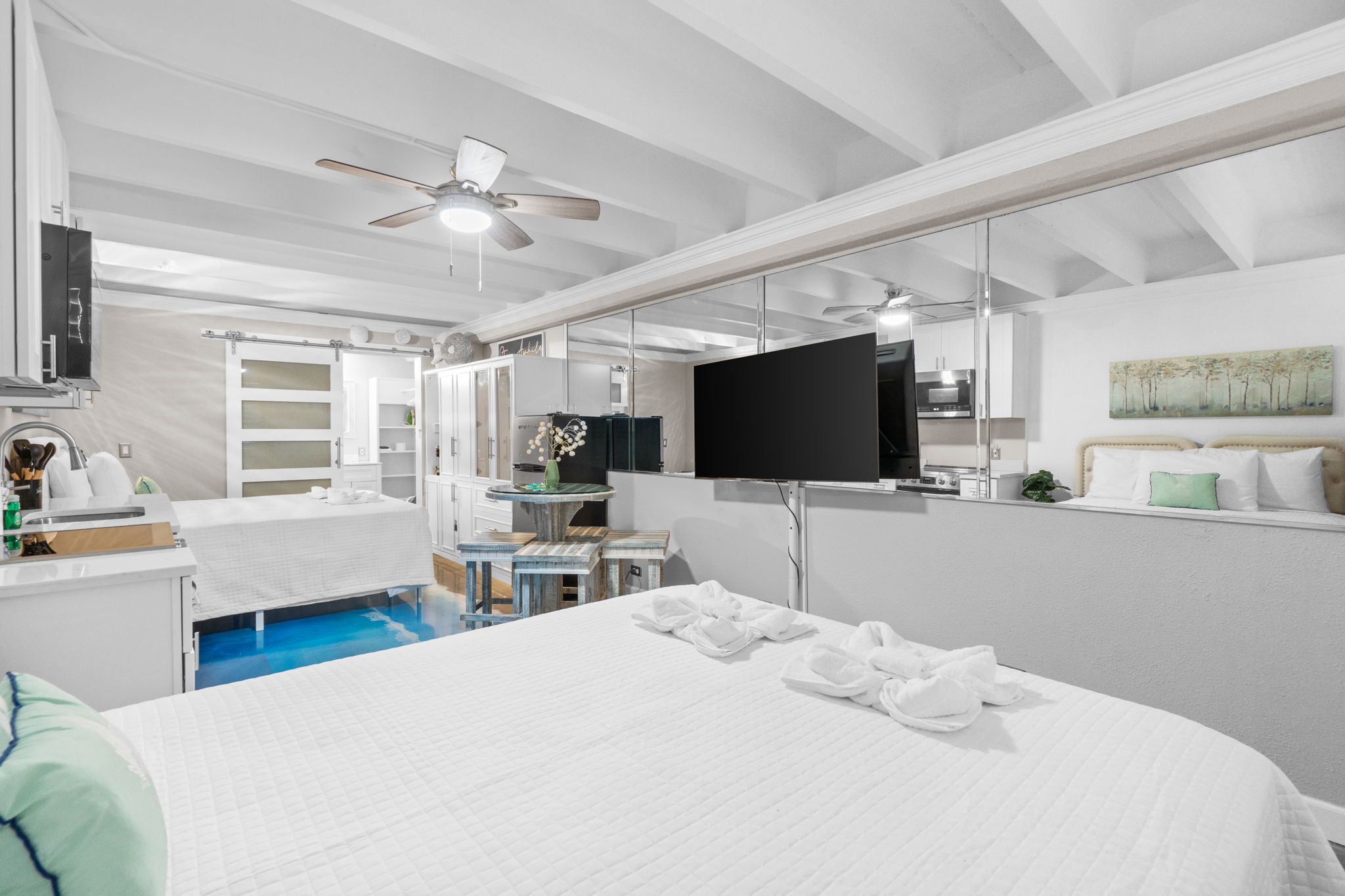 Living Room with Queen Bed and Queen Sleeper Sofa