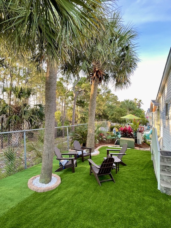 Take your shoes off and let the kids roll around on the beautiful turfed backyard. 