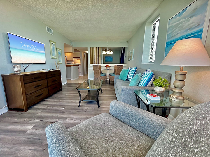 Seaside sophistication meets comfort in this living space!