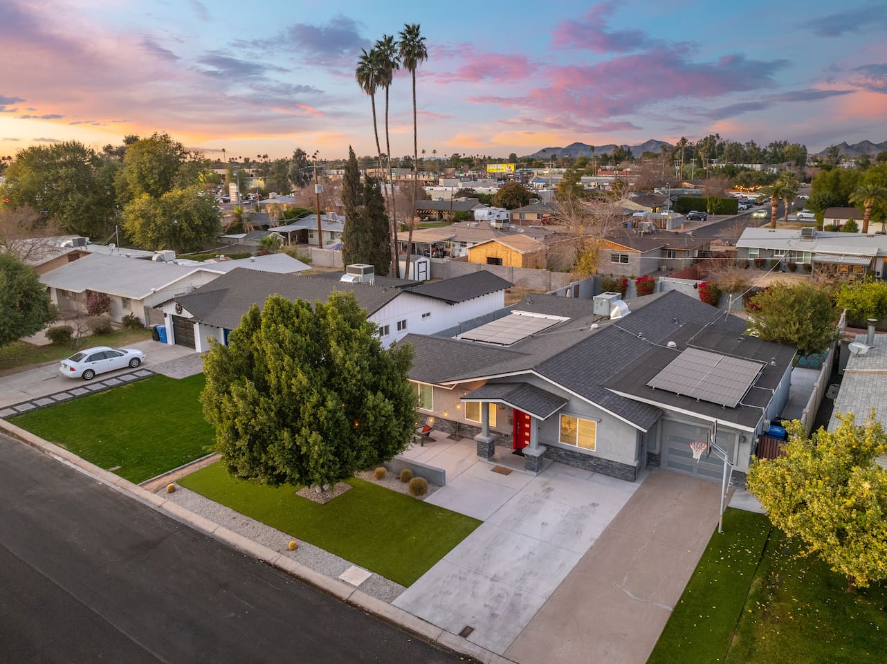 Aerial view of the house, capturing its full layout and surrounding landscape for a comprehensive perspective.