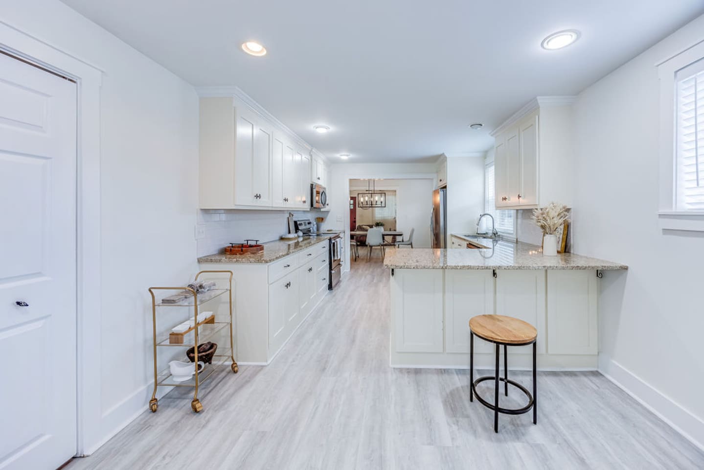 Bright and spacious kitchen with modern appliances and a clean, minimalist design.