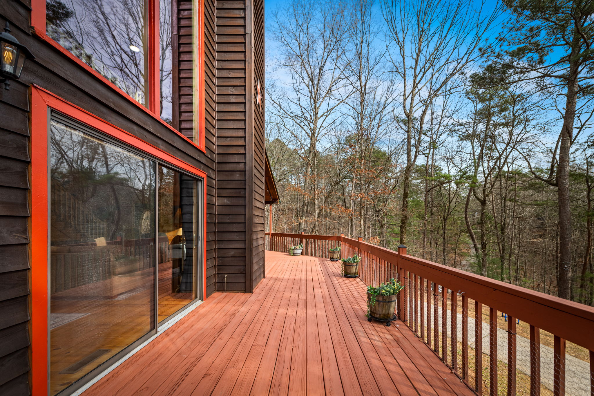 With its peaceful setting, the deck offers a refreshing and inviting extension of the living space.
