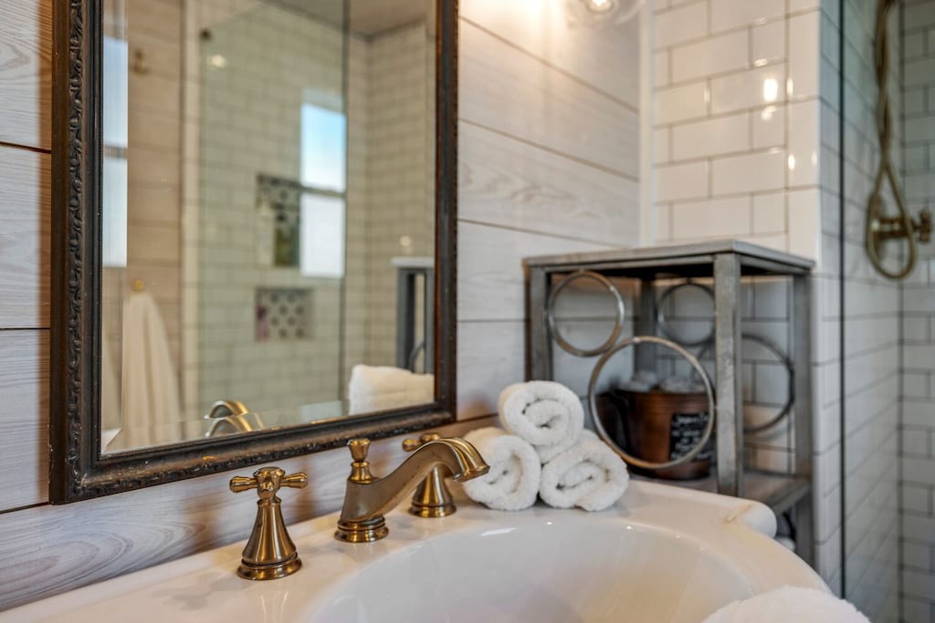 Brand new renovated bath with finishes that give a classic nod to the house's historic character.