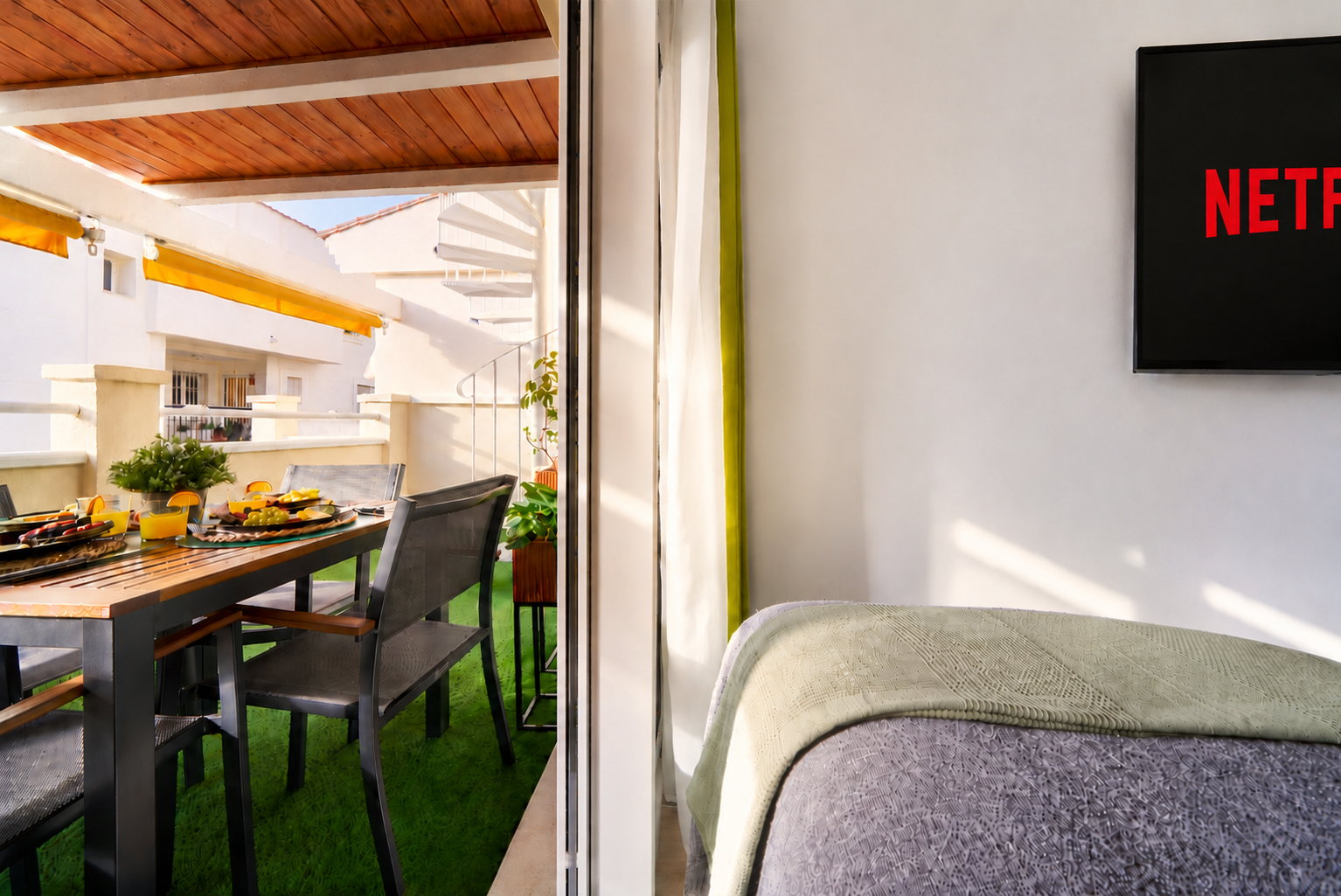 Bright and calming twin bedroom with tropical tones, soft linens, and direct access to the terrace - perfect for relaxed mornings and restful nights.