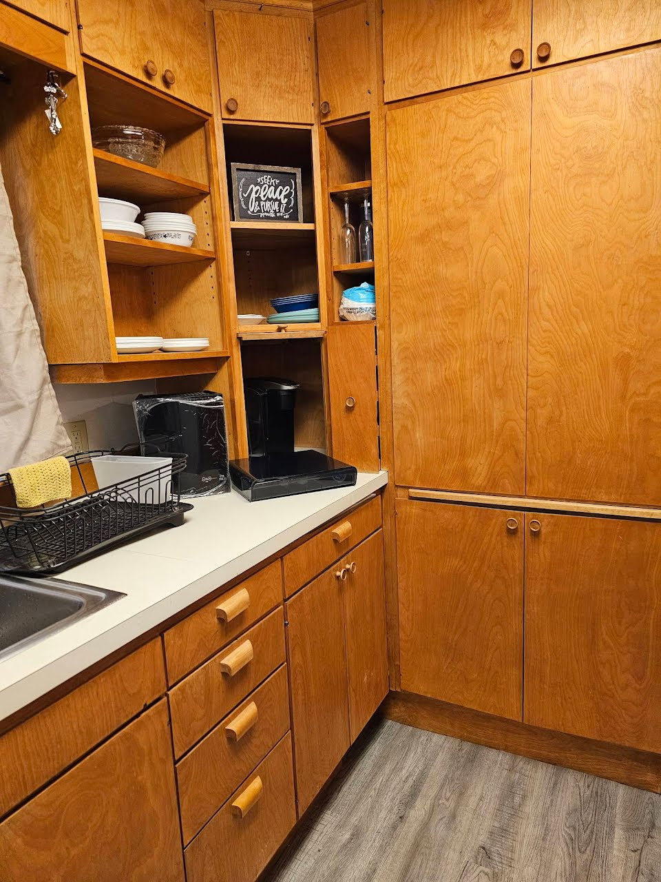 Full kitchen with plates, cups, silverware, pots, pans, and most essentials. Two types of coffee Keurig and drip.