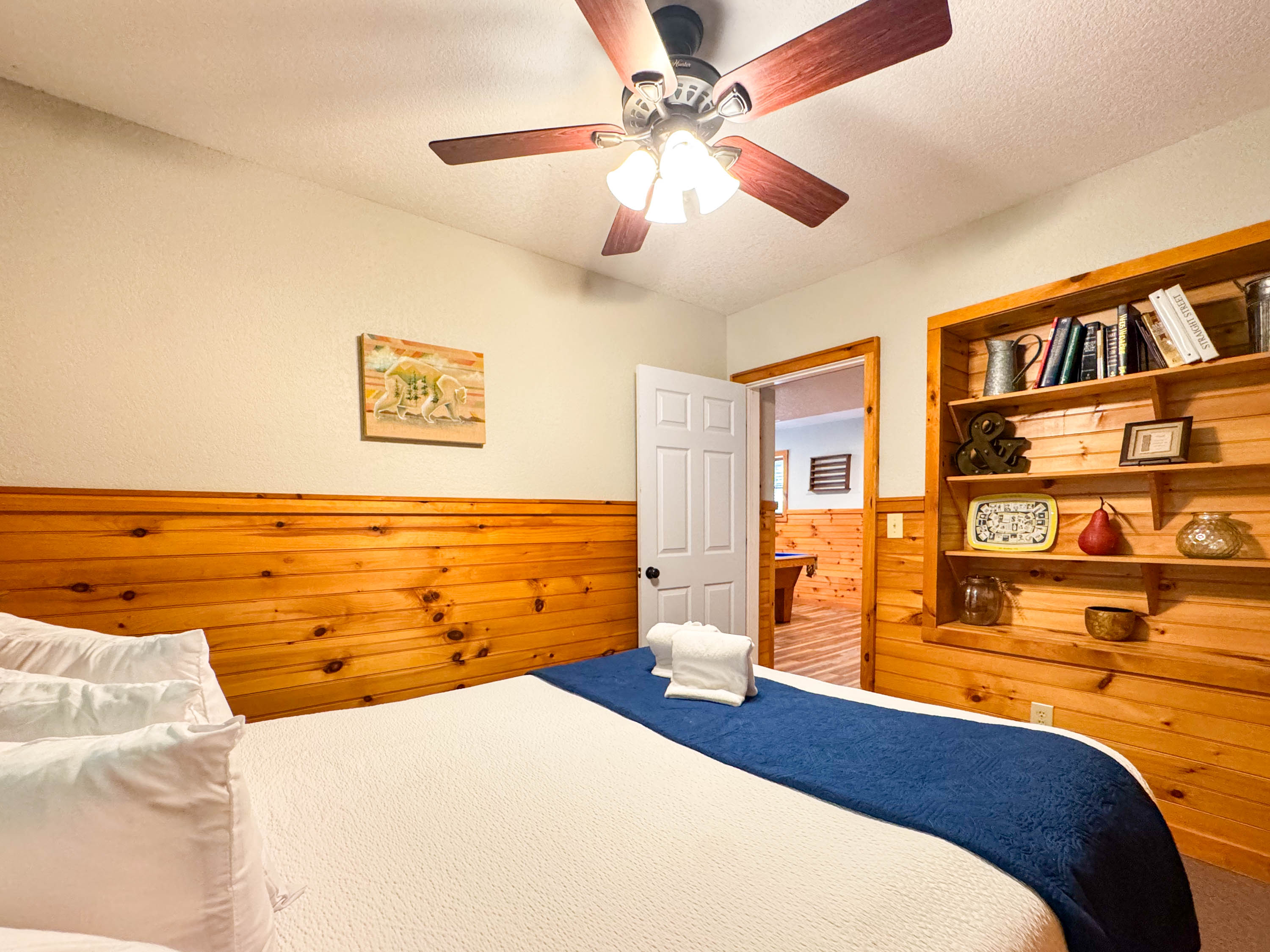 the Lower level bedroom is off the game room. It features a hybrid memory foam bed with shredded bamboo pillows. 