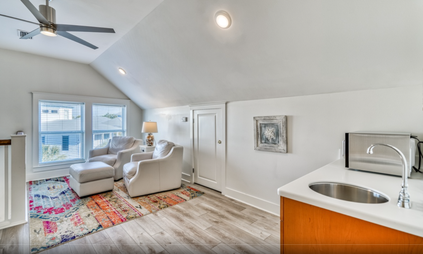 3rd floor landing area with Wet Bar