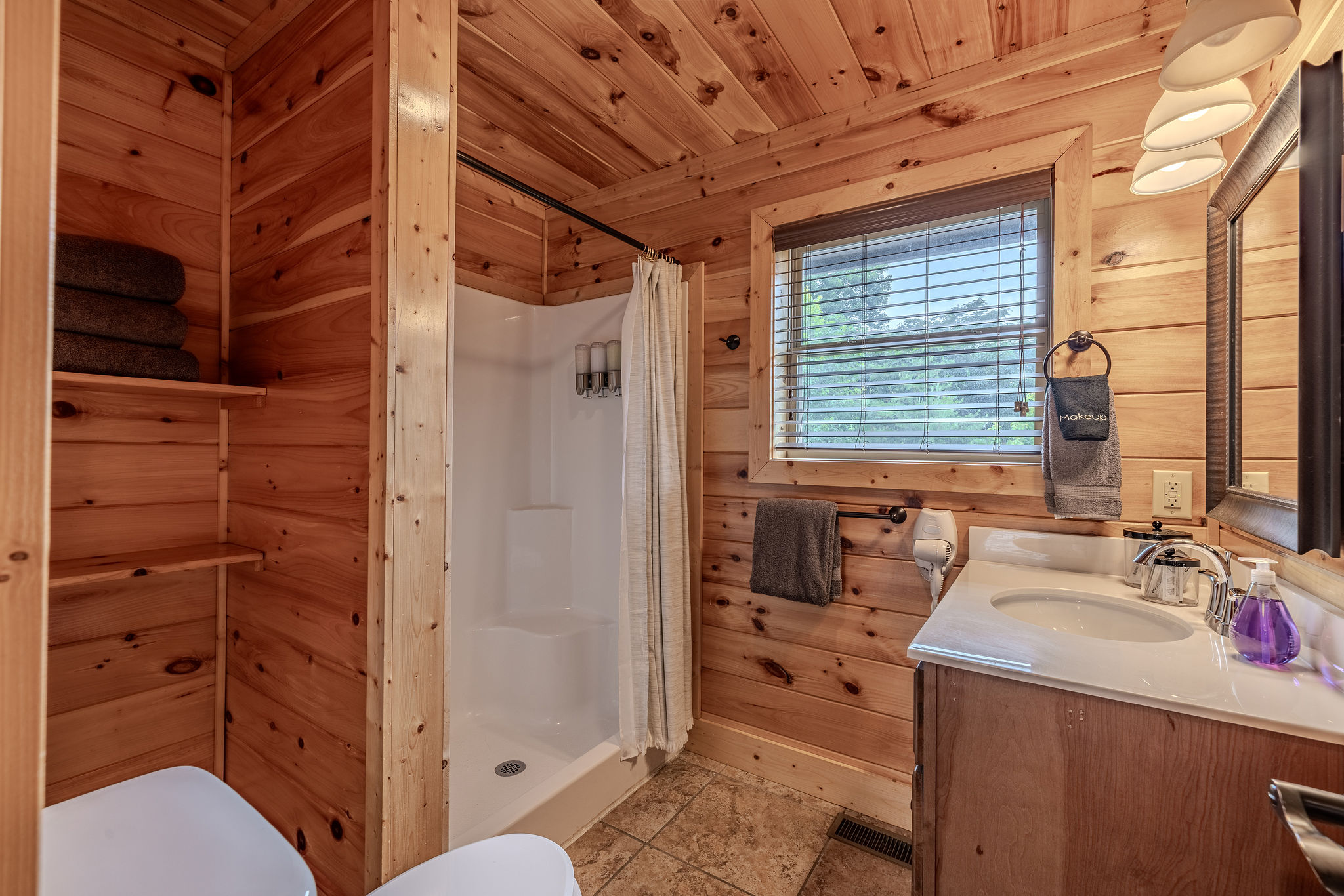 The Harmony Suite Ensuite Bathroom gives this upper-level king suite its own private bath, making group stays smoother and more comfortable.