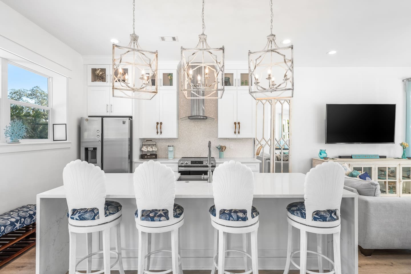 Chef’s kitchen featuring a sleek island, high-end appliances, and a premium coffee station. ☕️ Don't miss the unique seahorse handles imported from Bali!  Coastal luxury meets global style in this Blue Mountain Beach culinary retreat.