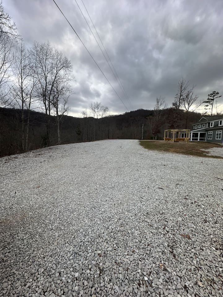 More parking and to the right is down to garage.