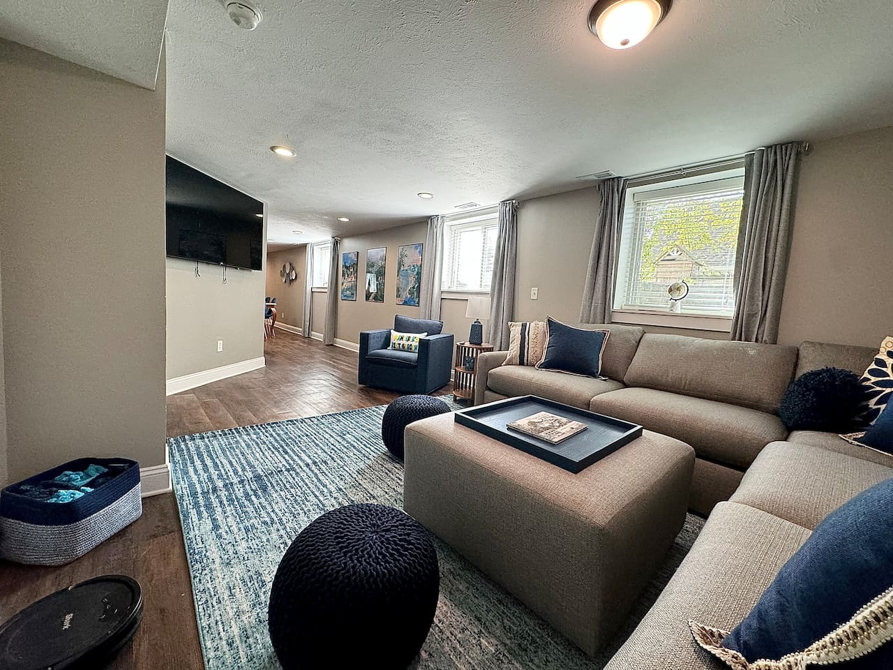 Enjoy a movie night with plenty of comfortable seating and a 65" Roku smart TV.