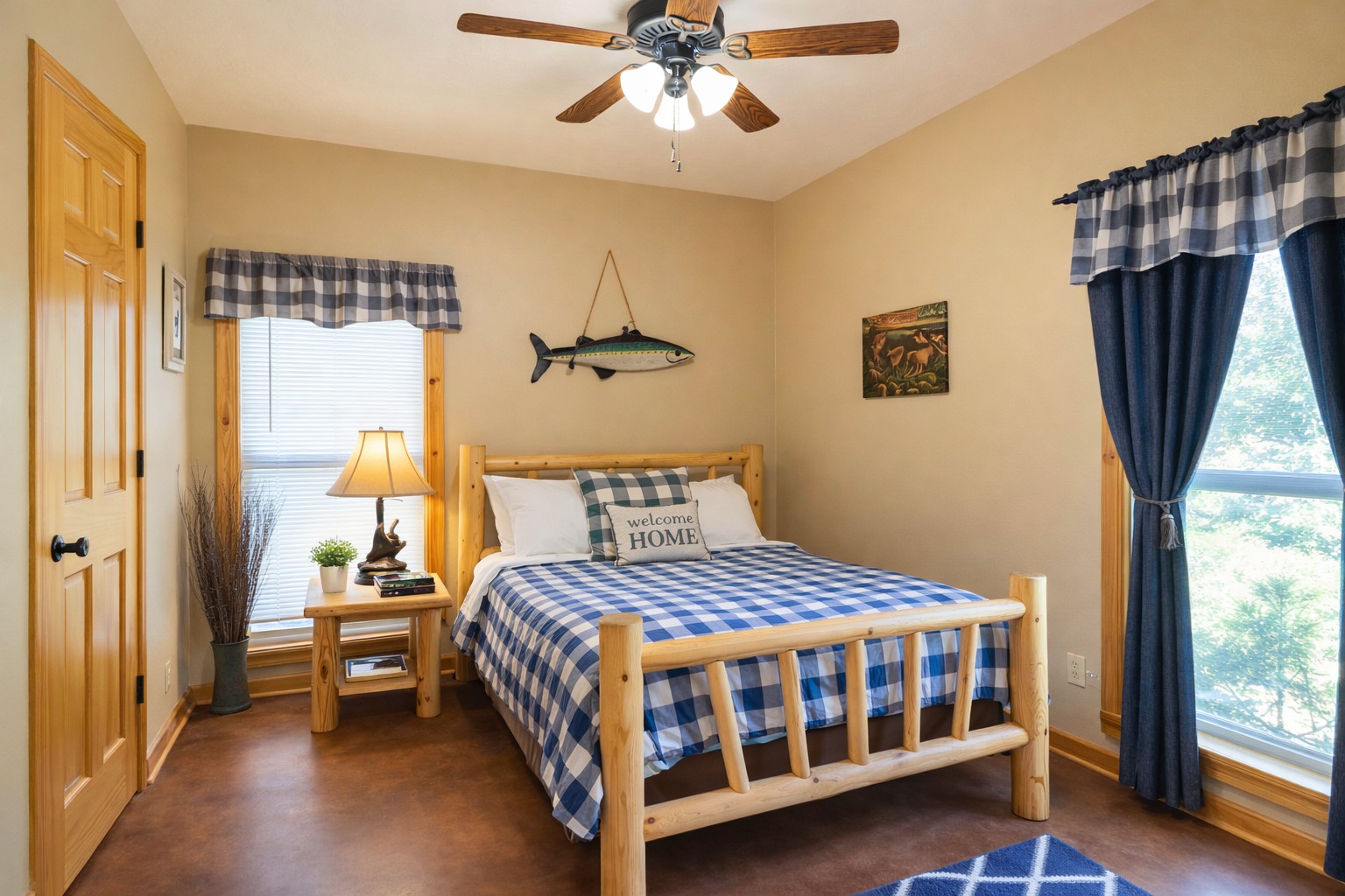 Main Floor Queen Bedroom #1 with ensuite bath (also hallway access) — ideal for couples.