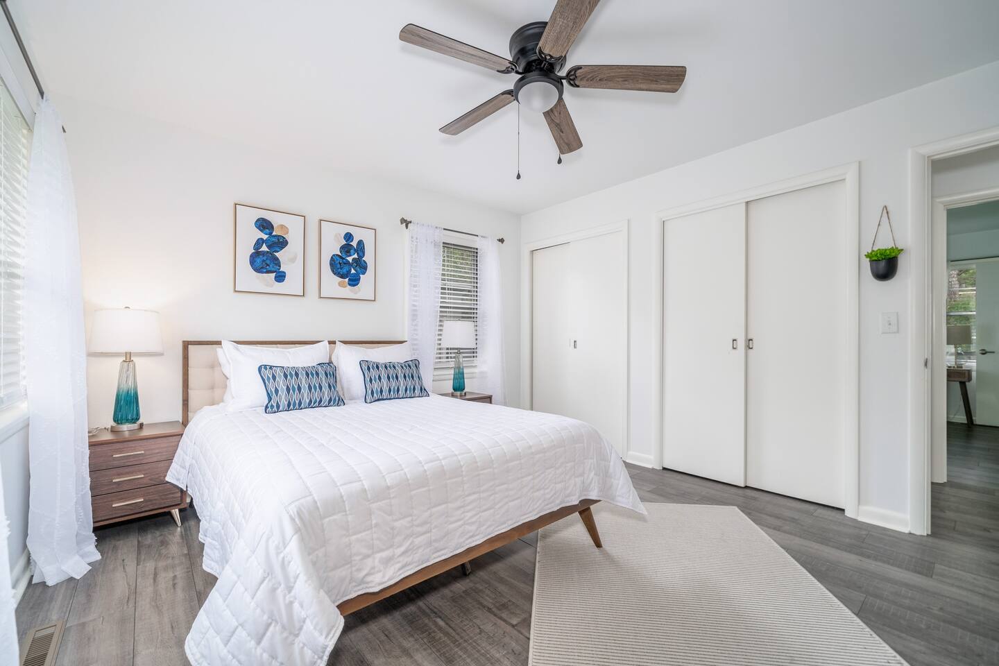 Queen Bedroom with Luxury linens, touch lamps, desk and chair