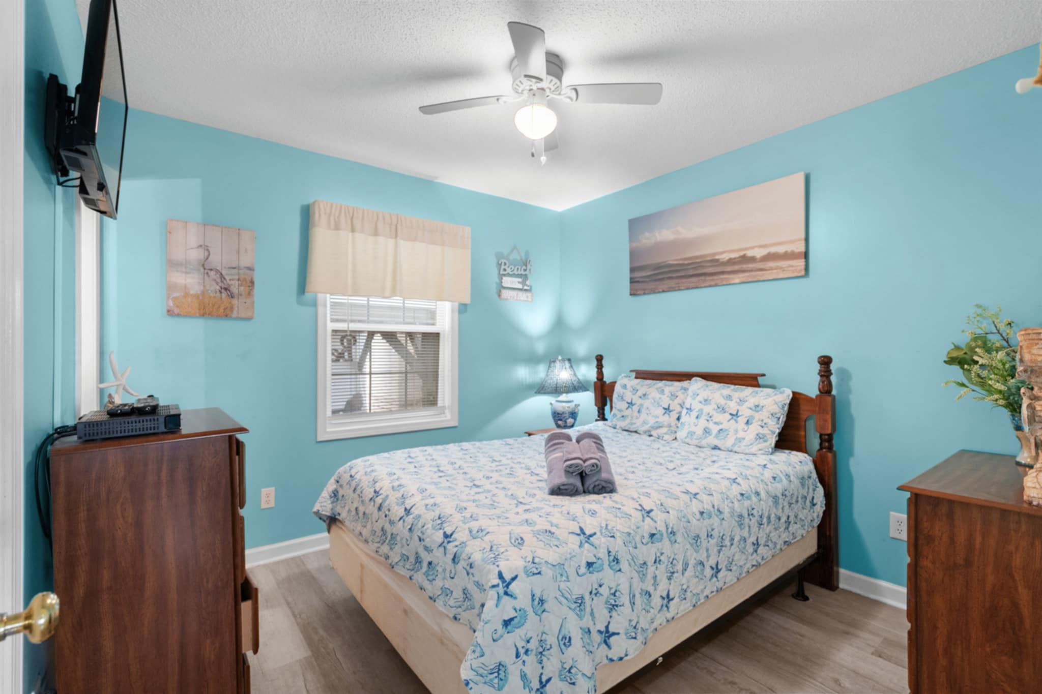 Queen sized bed in primary