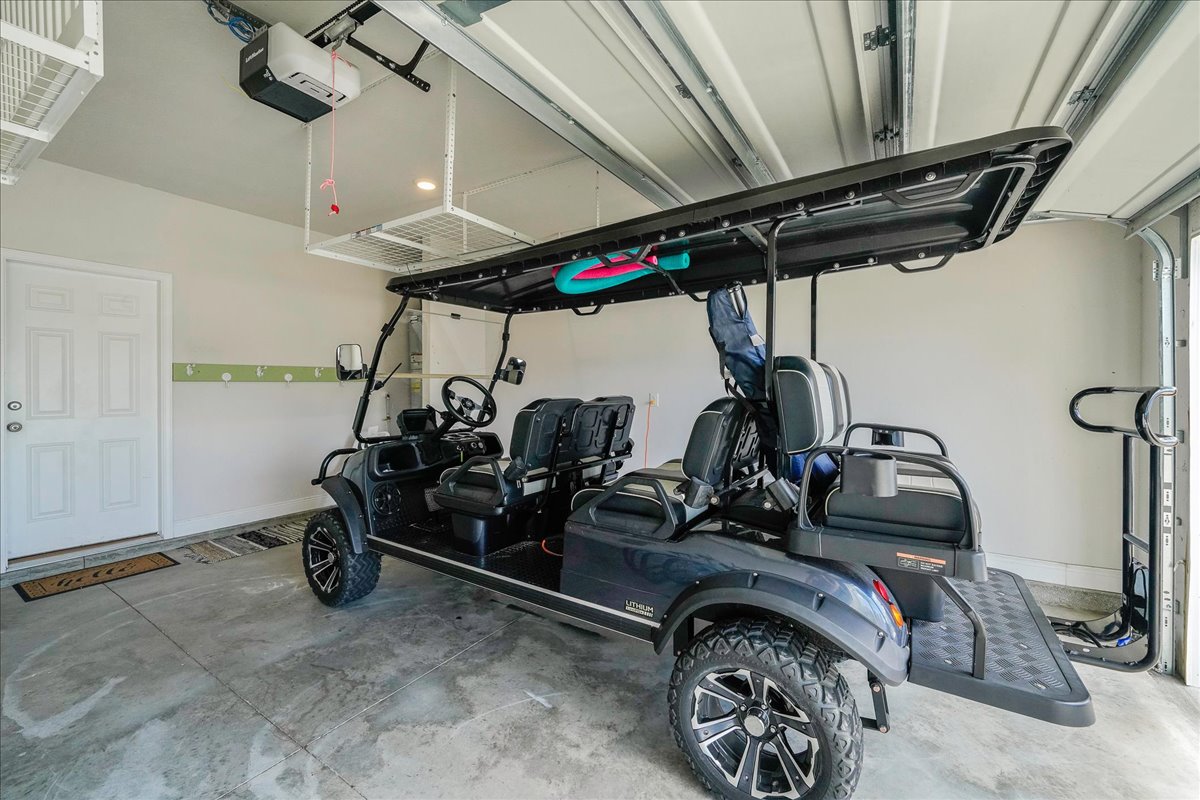 Adventure-ready garage with 6-seater golf cart 
