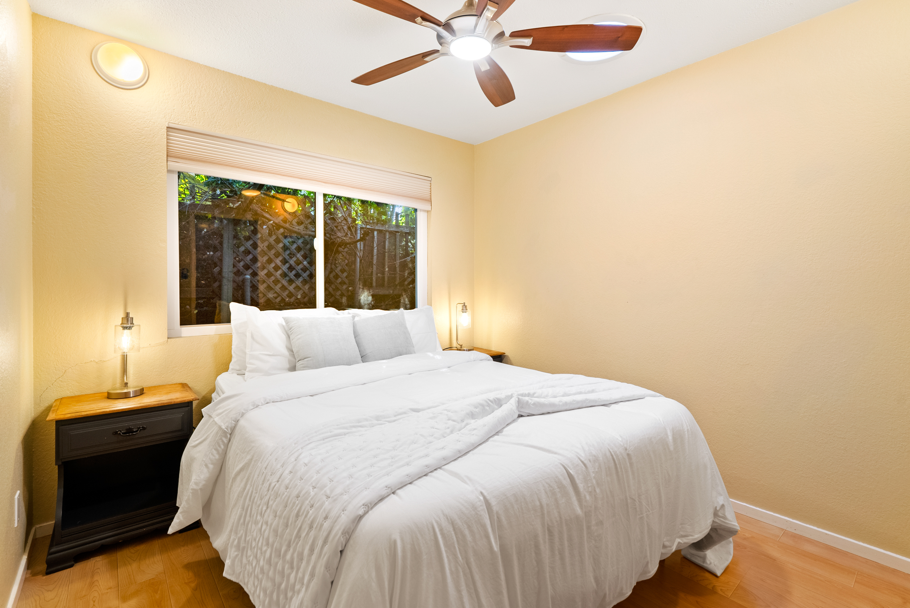 Sweet dreams await in this cozy sanctuary with ultra-plush bedding.